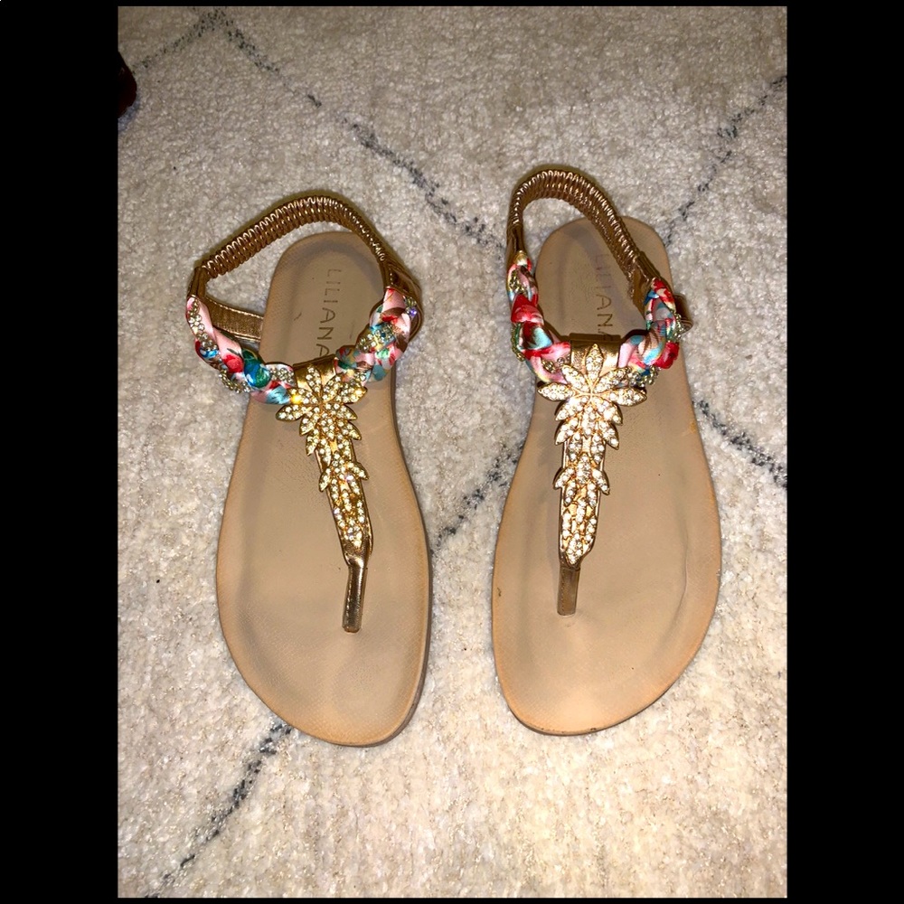 Jeweled sandals.